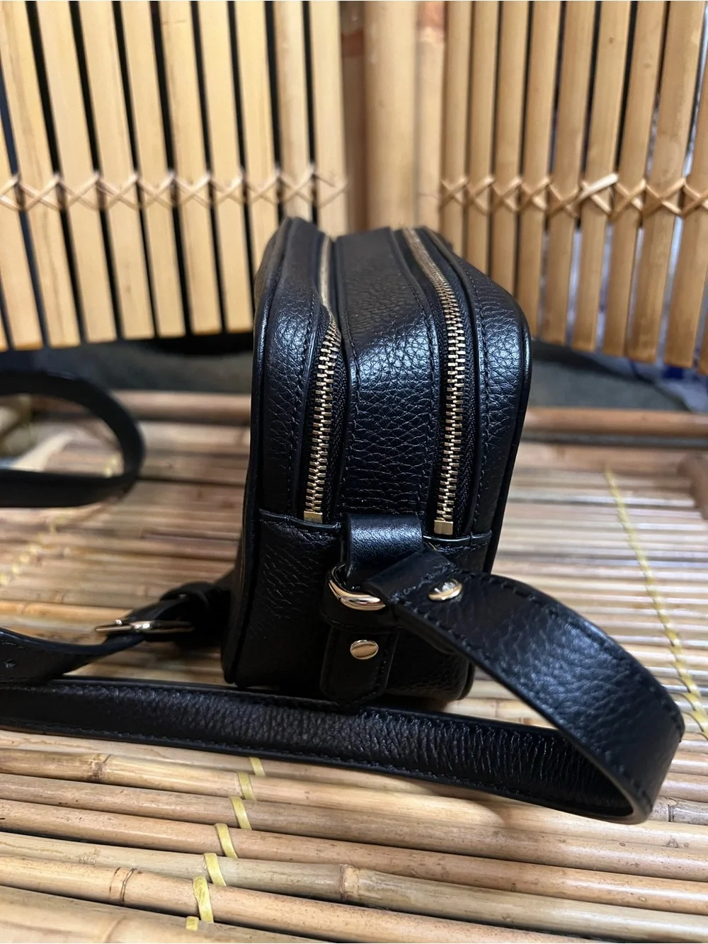 kate spade Pyper black pebbled leather crossbody camera bag